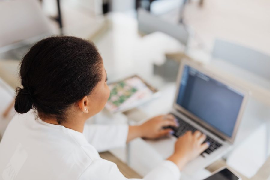 Employee organising business documents using digital metadata